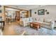 Inviting living room featuring a comfortable sectional sofa, hardwood floors, and open layout, ideal for relaxing and entertaining at 356 Hobcaw Dr, Mount Pleasant, SC 29464