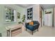 Bright, airy seating area featuring a comfortable chair, playful decor and natural light at 356 Hobcaw Dr, Mount Pleasant, SC 29464