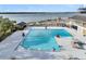 Large, inviting pool area with lifeguard stations, tables, and river views at 356 Hobcaw Dr, Mount Pleasant, SC 29464
