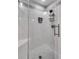 Modern shower features white subway tiles, a built-in niche, sleek fixtures, and a frameless glass door at 356 Hobcaw Dr, Mount Pleasant, SC 29464
