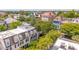 Captivating aerial view of charming homes nestled beneath a canopy of green trees at 39 N Adgers Wharf, Charleston, SC 29401