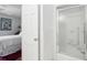 Bathroom featuring a glass shower and view into an adjacent bedroom at 39 N Adgers Wharf, Charleston, SC 29401