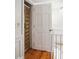 Hallway with an opening to an elevator featuring a bronze gate at 39 N Adgers Wharf, Charleston, SC 29401