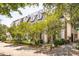 Quaint street view showcasing classic homes, trees, and inviting landscaping at 39 N Adgers Wharf, Charleston, SC 29401
