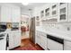 Functional kitchen featuring white cabinets, modern appliances, and an open layout at 39 N Adgers Wharf, Charleston, SC 29401