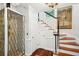 Elegant staircase and foyer area with an elevator for easy access at 39 N Adgers Wharf, Charleston, SC 29401