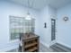 Cozy breakfast nook with natural light, a wooden table and seating for two at 411 Black Horse Rd, Moncks Corner, SC 29461