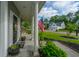 Inviting front porch with seating and decorative plants, perfect for relaxing at 411 Black Horse Rd, Moncks Corner, SC 29461
