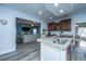 Charming kitchen featuring an island with a granite countertop and modern appliances at 411 Black Horse Rd, Moncks Corner, SC 29461