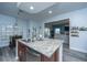 Spacious kitchen island with sink and stainless steel dishwasher at 411 Black Horse Rd, Moncks Corner, SC 29461
