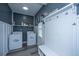 Well-organized laundry room with modern appliances and storage solutions at 411 Black Horse Rd, Moncks Corner, SC 29461