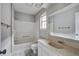 Bathroom featuring tub shower, single sink vanity and a large mirror at 414 Courtland Dr, Summerville, SC 29486