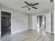 Spacious bedroom with modern ceiling fan, gray walls, and wood flooring at 414 Courtland Dr, Summerville, SC 29486
