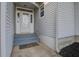 Front entrance with gray steps and a white glass door at 414 Courtland Dr, Summerville, SC 29486