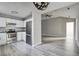 Open kitchen featuring stainless steel appliances and a spacious connected living area at 414 Courtland Dr, Summerville, SC 29486