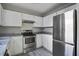 Modern kitchen featuring white cabinets, stainless steel appliances, and stylish countertops at 414 Courtland Dr, Summerville, SC 29486