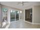 Sunroom featuring tile flooring, neutral paint, and access to a backyard patio with sliding glass door at 414 Courtland Dr, Summerville, SC 29486