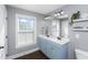 Bright bathroom featuring a double vanity, great light and updated fixtures at 4906 W Liberty Park Cir, North Charleston, SC 29405