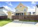 Charming home with a fenced yard, shed, beautiful lawn, and inviting curb appeal at 4906 W Liberty Park Cir, North Charleston, SC 29405