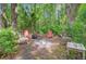 Backyard view showing a firepit and chairs at 4911 Chisolm Rd, Johns Island, SC 29455