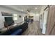 Open floor plan with eat-in kitchen, recessed lights, wood flooring, and modern finishes at 4911 Chisolm Rd, Johns Island, SC 29455