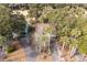 Aerial shot showing the house situated among trees and lush landscaping at 507 Cobby Creek Ln, Seabrook Island, SC 29455
