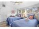Charming bedroom featuring two twin beds with patriotic bedding and nautical décor at 507 Cobby Creek Ln, Seabrook Island, SC 29455