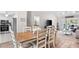 Bright dining area adjacent to the living room and kitchen at 507 Cobby Creek Ln, Seabrook Island, SC 29455