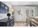 Bright dining room with coastal decor and natural light, with views of the outdoors at 507 Cobby Creek Ln, Seabrook Island, SC 29455