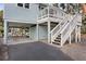 Raised coastal home with parking and storage underneath, accessible by stairs at 507 Cobby Creek Ln, Seabrook Island, SC 29455