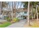 Home exterior featuring a covered area underneath and a long driveway at 507 Cobby Creek Ln, Seabrook Island, SC 29455