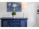 Close-up of a stylish cabinet with coastal-themed decor and a lamp at 507 Cobby Creek Ln, Seabrook Island, SC 29455