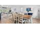 Open-concept layout with dining, living room, and kitchen flowing together at 507 Cobby Creek Ln, Seabrook Island, SC 29455