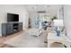 Cozy living room with hardwood floors, modern furniture and bright natural light at 507 Cobby Creek Ln, Seabrook Island, SC 29455