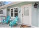 Welcoming front porch with seating, coastal decor, and a bright entrance at 507 Cobby Creek Ln, Seabrook Island, SC 29455