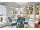 Sun room featuring dining table with seating for four and lots of natural light at 507 Cobby Creek Ln, Seabrook Island, SC 29455