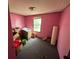 Bedroom with pink walls and one window at 5626 Shelton St, North Charleston, SC 29406
