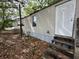 Exterior view of home with weathered steps at 5626 Shelton St, North Charleston, SC 29406