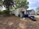Exterior shot of home with trash in backyard at 5626 Shelton St, North Charleston, SC 29406