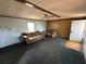View of the living room featuring neutral walls, carpet, and furniture at 5626 Shelton St, North Charleston, SC 29406