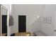 Bright foyer with a coat rack, bench, and stylish artwork at 575 Red Monarch Way, Moncks Corner, SC 29461