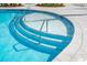 Zero entry pool with tiered access, stainless steel handrails, and slip resistant concrete at 575 Red Monarch Way, Moncks Corner, SC 29461