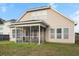 Spacious backyard with a screened porch, perfect for outdoor entertaining at 589 Crossland Dr, Moncks Corner, SC 29461