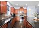 Modern kitchen boasting stainless steel appliances, dark countertops, and ample cabinetry at 589 Crossland Dr, Moncks Corner, SC 29461