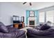 Cozy living room featuring a fireplace and large tv for entertainment at 589 Crossland Dr, Moncks Corner, SC 29461
