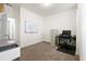 A well-lit office space with a whiteboard, desk, and printer provides a functional work-from-home setup at 589 Crossland Dr, Moncks Corner, SC 29461