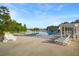 Lounge chairs surround the serene community swimming pool with covered gazebo at 589 Crossland Dr, Moncks Corner, SC 29461