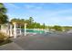 Community pool with gazebo and chairs overlooking serene lake waters at 589 Crossland Dr, Moncks Corner, SC 29461