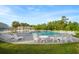 A swimming pool surrounded by ample seating and lounge chairs at 589 Crossland Dr, Moncks Corner, SC 29461