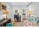 Inviting bedroom with decorative features, carpet and an open door to the kitchen at 62 Gadsden St # A, Charleston, SC 29401